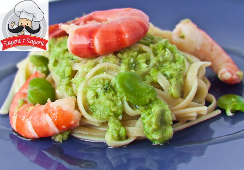 Spaghetti con gamberoni su crema di fave